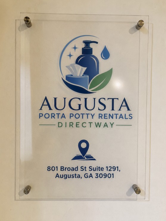 Close-up of the Augusta Porta Potty Rentals Directway acrylic sign showing the store address